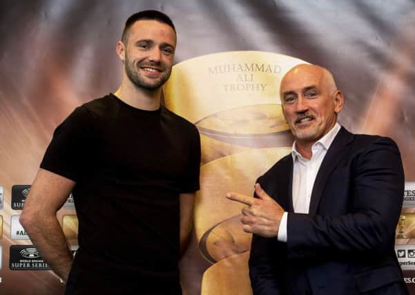 Josh Taylor alongside promoter Barry McGuigan ahead of the WBSS quarter-final against Ryan Martin next month. Pic: Bill Murray/SNS