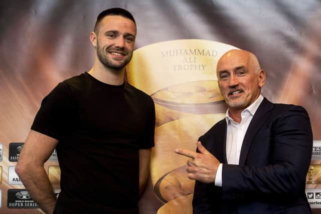 Josh Taylor alongside promoter Barry McGuigan ahead of the WBSS quarter-final against Ryan Martin next month. Pic: Bill Murray/SNS