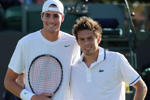 John Isner, left, and Nicolas Mahut took part in the longest match - 11 hours and 5 minutes - in 2010. Picture: Getty Images