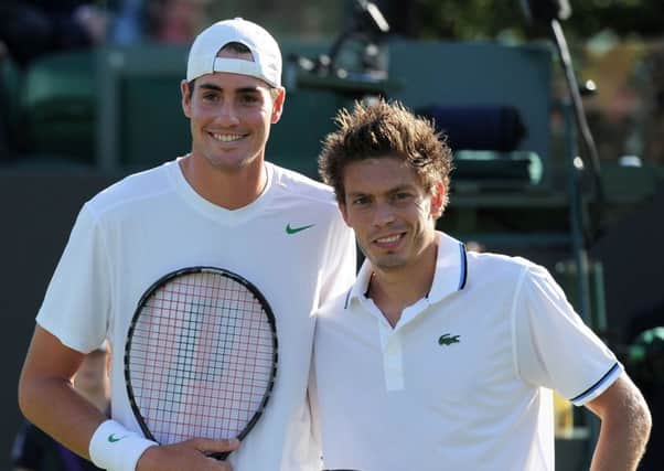 John Isner, left, and Nicolas Mahut took part in the longest match - 11 hours and 5 minutes - in 2010. Picture: Getty Images