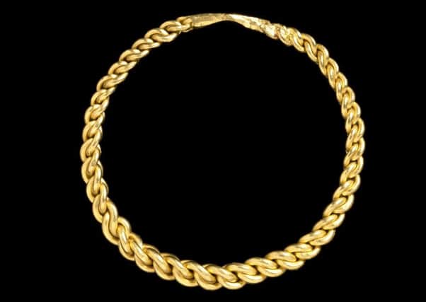 Gold arm-ring from Oxna, Shetland - one of a few objects dated specifically to the 11th Century. PIC: NMS.