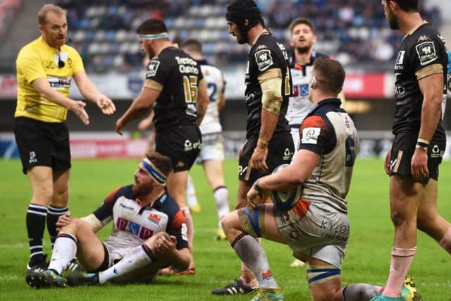 Simon Berghan, second left, is penalised for obstruction and Magnus Bradburys try against Montpellier is chalked off. Picture: SNS/SRU