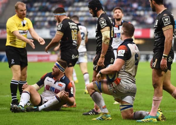 Simon Berghan, second left, is penalised for obstruction and Magnus Bradburys try against Montpellier is chalked off. Picture: SNS/SRU