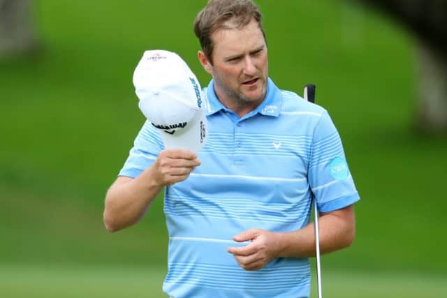 Scotlands Marc Warren was two under par after playing nine holes of his second round. Picture: Warren Little/Getty