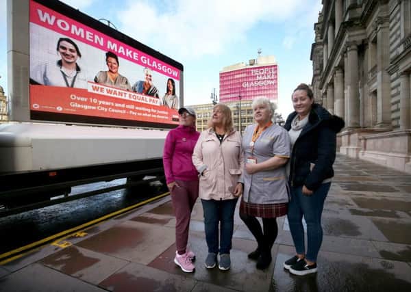 Glasgow City Council workers at the launch of a poster backing their cause in George Square, last week. Picture: Jane Barlow/PA