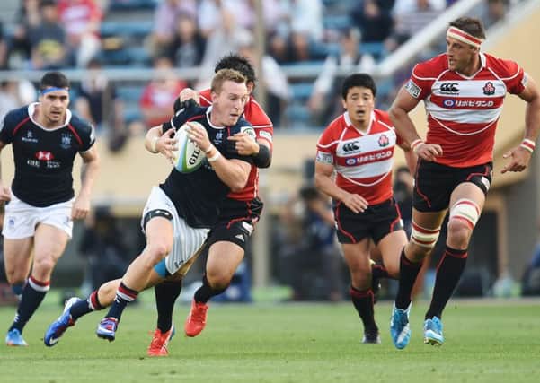 Hong Kong (dark blue) take on Japan in the Asian five nations. Picture: Atsushi Tomura/Getty