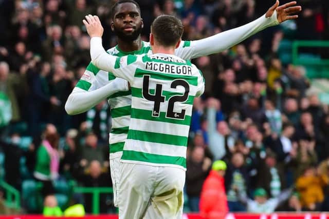 Celtic's Odsonne Edouard celebrates with Callum McGregor (right) after he makes it 4-2. Picture: SNS Group