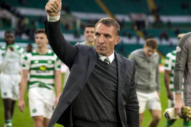 Celtic manager Brendan Rodgers applauds the fans after his side's 4-2 victory over Hibs. Picture: SNS