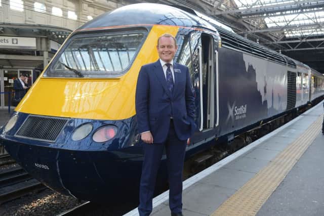 ScotRail MD Alex Hynes with the newly refurbished trains earlier this month. Picture: Jon Savage