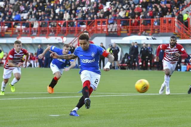 James Tavernier puts Rangers back in front from the penalty spot. Picture: SNS