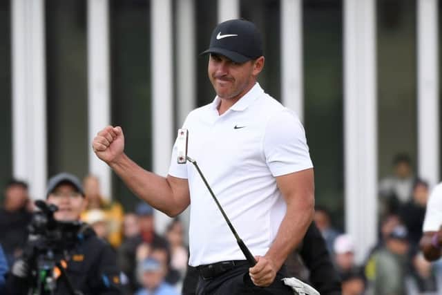 Brooks Koepka reacts to his CJ Cup win, a success with which he toppled Dustin Johnson as No 1. Picture: AFP/Getty
