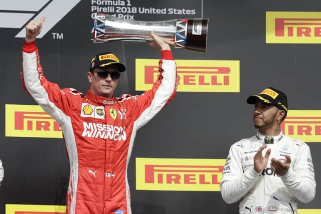 Ferraris Kimi Raikkonen celebrates after winning the US Grand Prix at the Circuit of the Americas. Picture: AP.