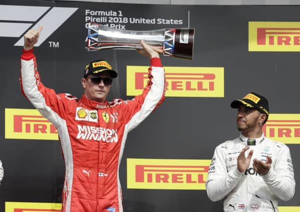 Ferraris Kimi Raikkonen celebrates after winning the US Grand Prix at the Circuit of the Americas. Picture: AP.