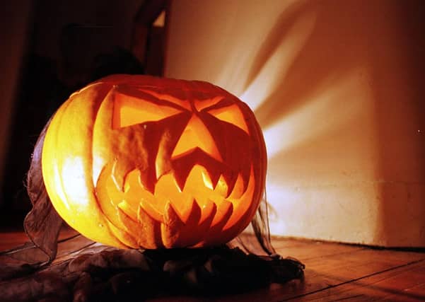 Carved out Pumpkin at Halloween with candle inside
