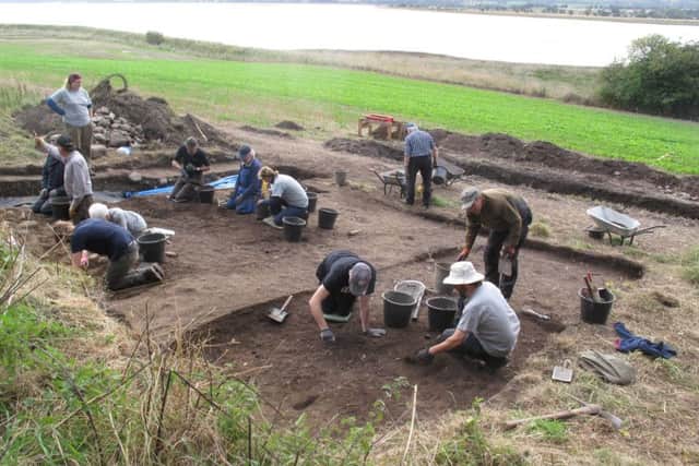 Archaeologists at work at the raised beach overlooking the Beauly Firth where the objects were found. PIC: Tarradale Through Time.