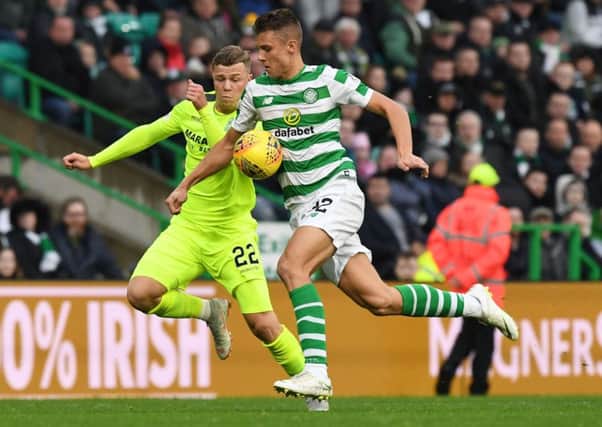 Filip Benkovic, in action against Hibernian on Saturday, is eager to add to the European experience  he gained with Dinamo Zagreb. Picture: SNS.