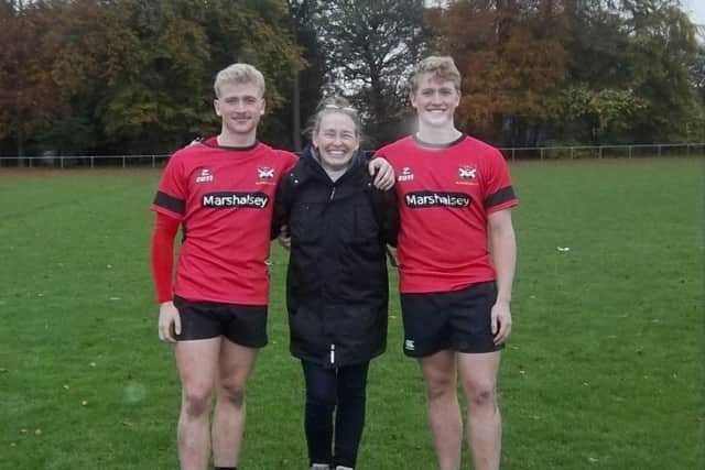 Callum Kennedy (left) and Timmy Kennedy (right), their mum Belinda (centre), in their final match for Glenrothes before Callum goes out to play in Australia with West Bulldogs