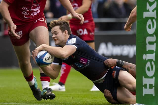 Chris Dean scores Edinburgh's bonus-point try against Toulon. Picture: SNS
