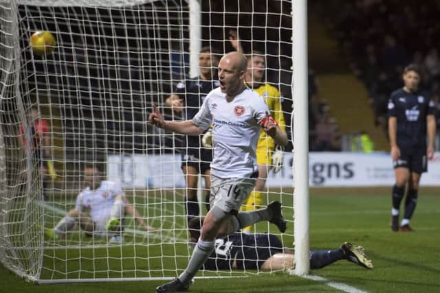 Steven Naismith celebrates scoring Hearts' second goal of the evening. Picture: SNS Group