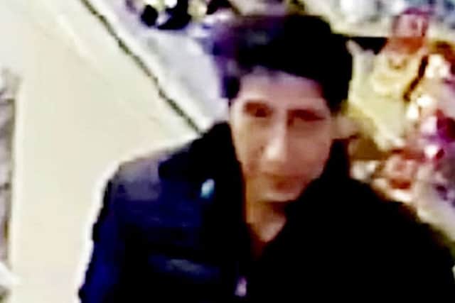 Police have shared a CCTV image of a very unfriendly bloke swiping beer from a restaurant - and he's a spitting image of Friends character Ross Geller. Picture: SWNS