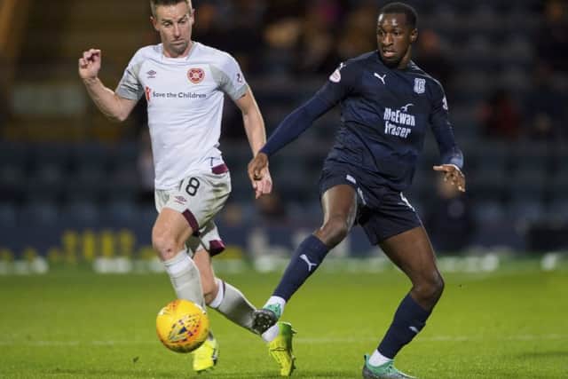 Hearts' Steven MacLean, left, in action with Dundee's Glen Kamara. Picture: Bill Murray/SNS