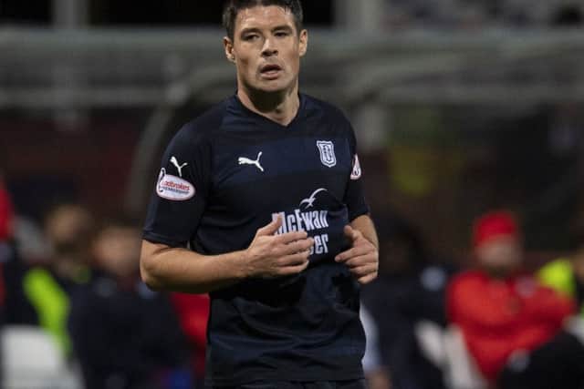 Dundee's Darren O'Dea in action against Hearts. Picture: Ross MacDonald/SNS
