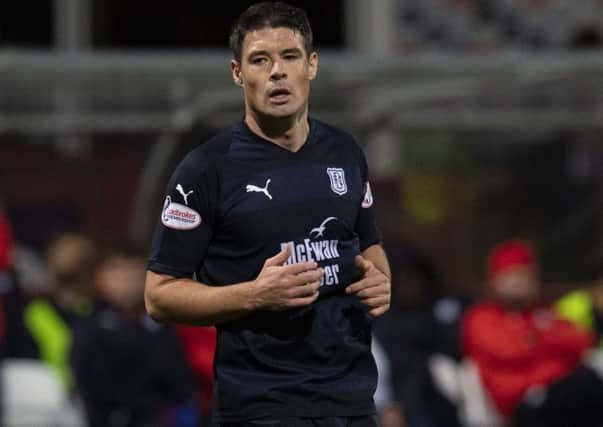Dundee's Darren O'Dea in action against Hearts. Picture: Ross MacDonald/SNS