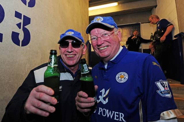 Leicester City fans enjoy a beer at the stadium prior to an English Premier League match. Picture: Getty Images