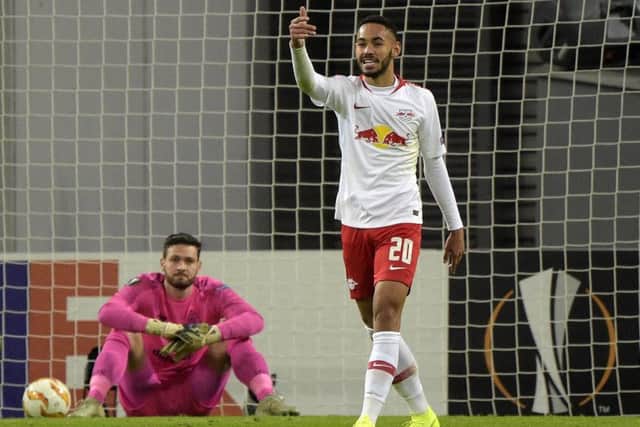 Matheus Cunha celebrates after opening the scoring. Picture: AP