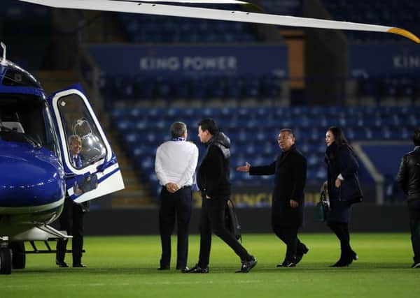 Leicester City chairman Vichai Srivaddhanaprabha (third right, holding out hand) getting into a helicopter after a match at the King Power Stadium. Picture: Nick Potts/PA Wire