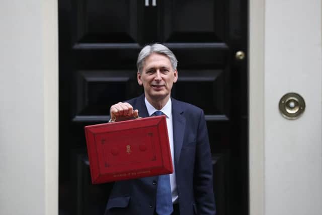 Philip Hammond revealed the contents of his Budget box. Picture: Getty