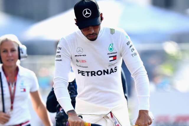 Lewis Hamilton scoots around the Mercedes garage during practice for tomorrows Mexican GP. Picture: Getty.