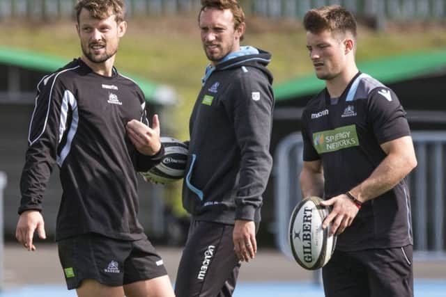Peter Horne, left, and George Horne, right, with Glasgow kicking coach Mike Blair at training. Picture: Gary Hutchison/SNS/SRU
