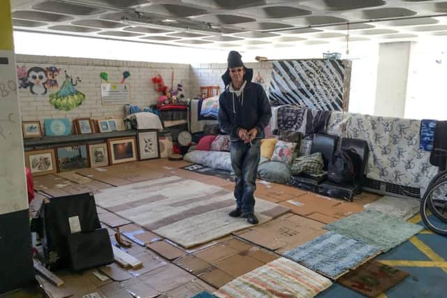 A homeless man has turned the fourth floor of a multi-storey car park into his personal "hotel" - complete with framed pictures, furniture, bedding and rugs. Picture: SWNS