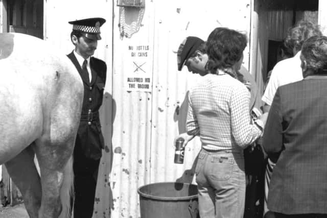 A Scotland-England game at Hampden in May 1980, when police tried to make sure that no alcohol made it into the stadium. Picture: Stan Warburton