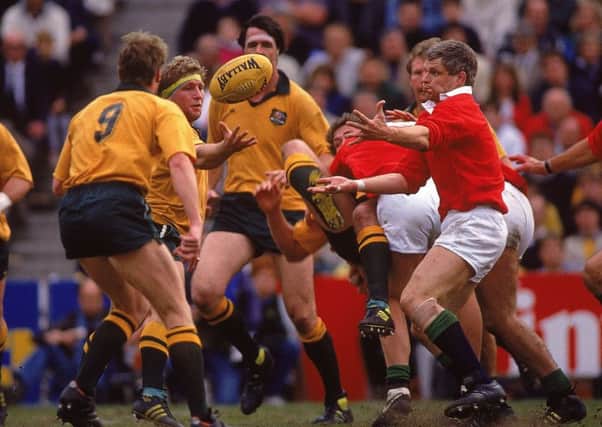 Finlay Calder, right, in action for the Lions against Australia. Picture: Billy Stickland /Allsport