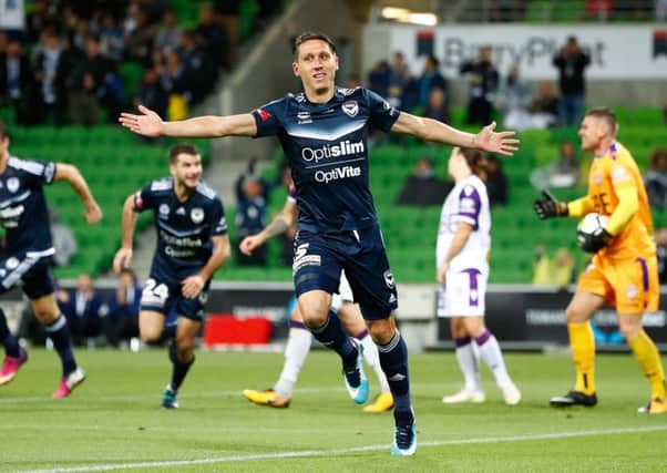 Hibs player Mark Milligan has played in derby matches all over the world, including at Melbourne Victory. Picture: Scott Barbour/Getty Images