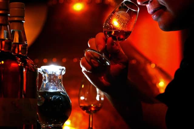 Scotland's whisky producers fear that Chancellor Philip Hammond is preparing to announce an increase to spirit duty in his budget tomorow. Picture: Getty Images