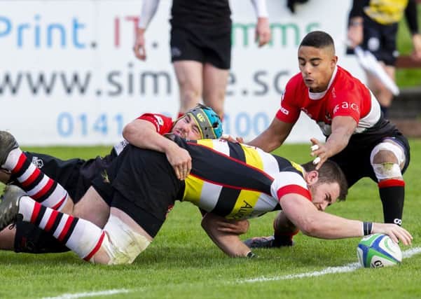 Stirling's Hamilton Burr goes over for a try. Picture: Bruce White/SNS