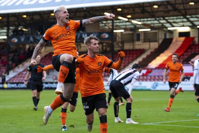 Dundee United's Fraser Aird and Billy King celebrates after King  made it 2-0. Picture: SNS