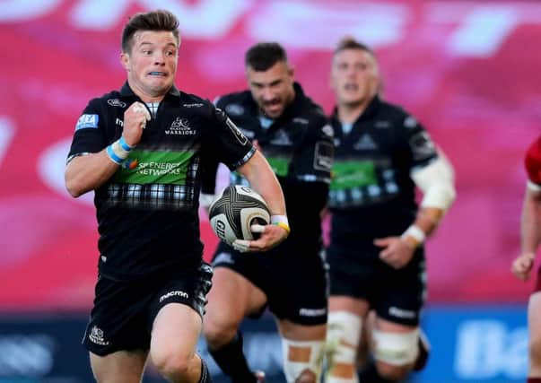 Glasgow's George Horne breaks free to score the first of his two tries against Munster. Picture: Ryan Byrne/INPHO/REX/Shutterstock