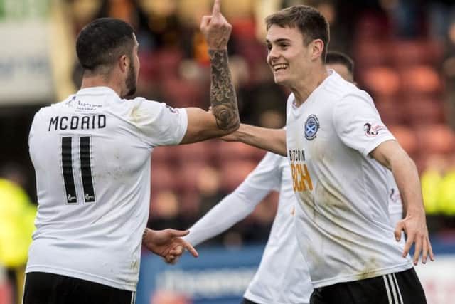 Ayr United's Michael Rose (right) and Declan McDaid celebrate the only goal of the game. Picture: SNS