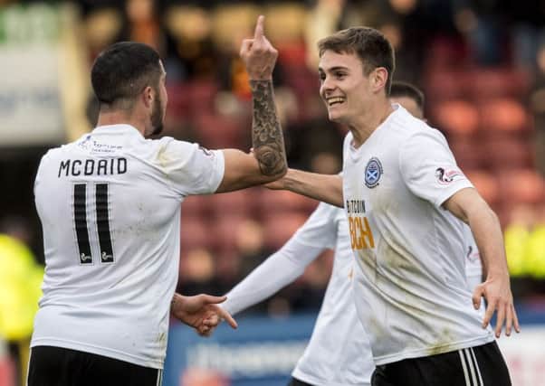 Ayr United's Michael Rose (right) and Declan McDaid celebrate the only goal of the game. Picture: SNS