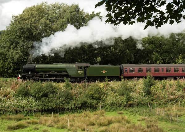 The Flying Scotsman steam locomotive travels along the East Lancashire Railway's line. Picture: OLI SCARFF / AFP)OLI SCARFF/AFP/Getty Images.