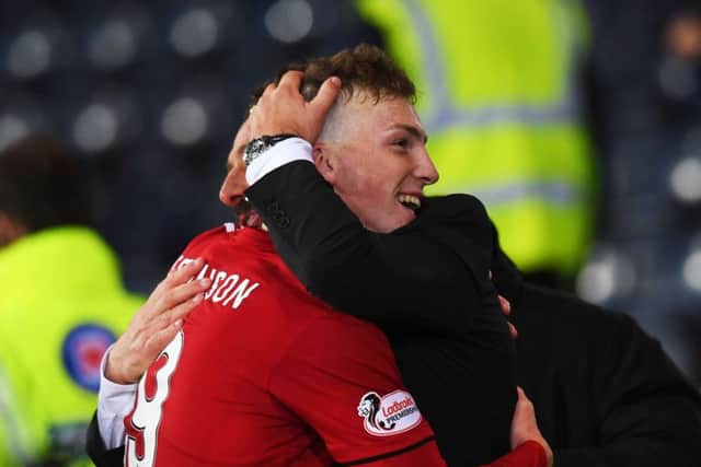 Aberdeens Hampden matchwinner Lewis Ferguson celebrates with his manager Derek McInnes at full-time. Picture: SNS.