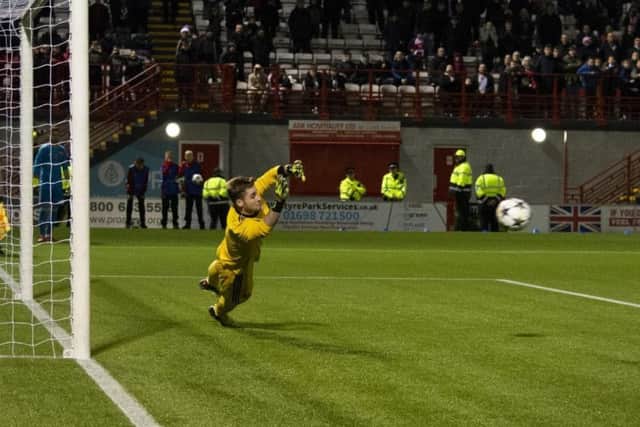 Cumbernauld teenager Ross Connelly saves a penalty to help Hamilton Accies beat FC Basel in the Uefa Elite Youth League (pic courtesy of Dan Wild)