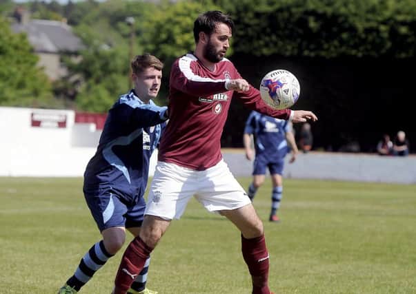 Tommy Coyne hit a hat-trick as Linlithgow Rose went top of the table (pic: Michael Gillen)