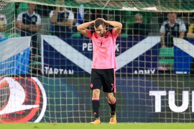 James McArthurs final game for Scotland was a costly draw in Slovenia.  Picture: PA