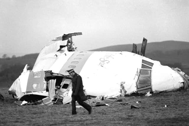 The wrecked nose section of Pan Am flight 103 in a field at Lockerbie, near Dumfries, after the plane was blown apart by a terrorist bomb. Picture: PA Wire