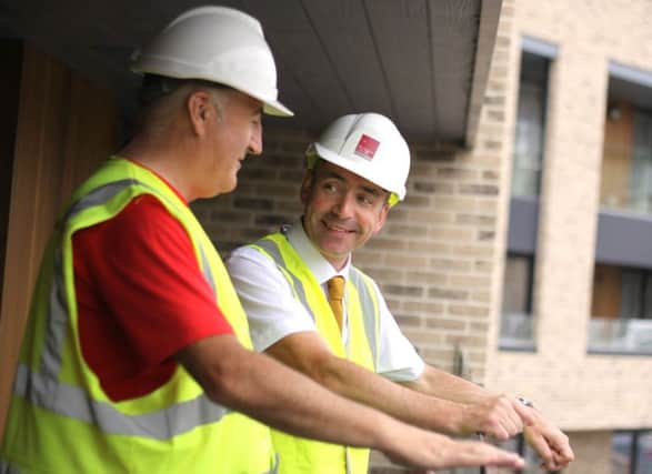 Chief executive Ed Monaghan pictured to the right, on site. Picture: Contributed
